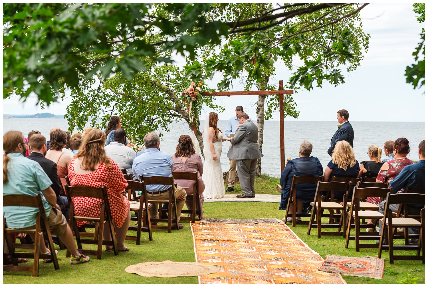 wedding ceremony on lake superior at presque isle near black rocks
