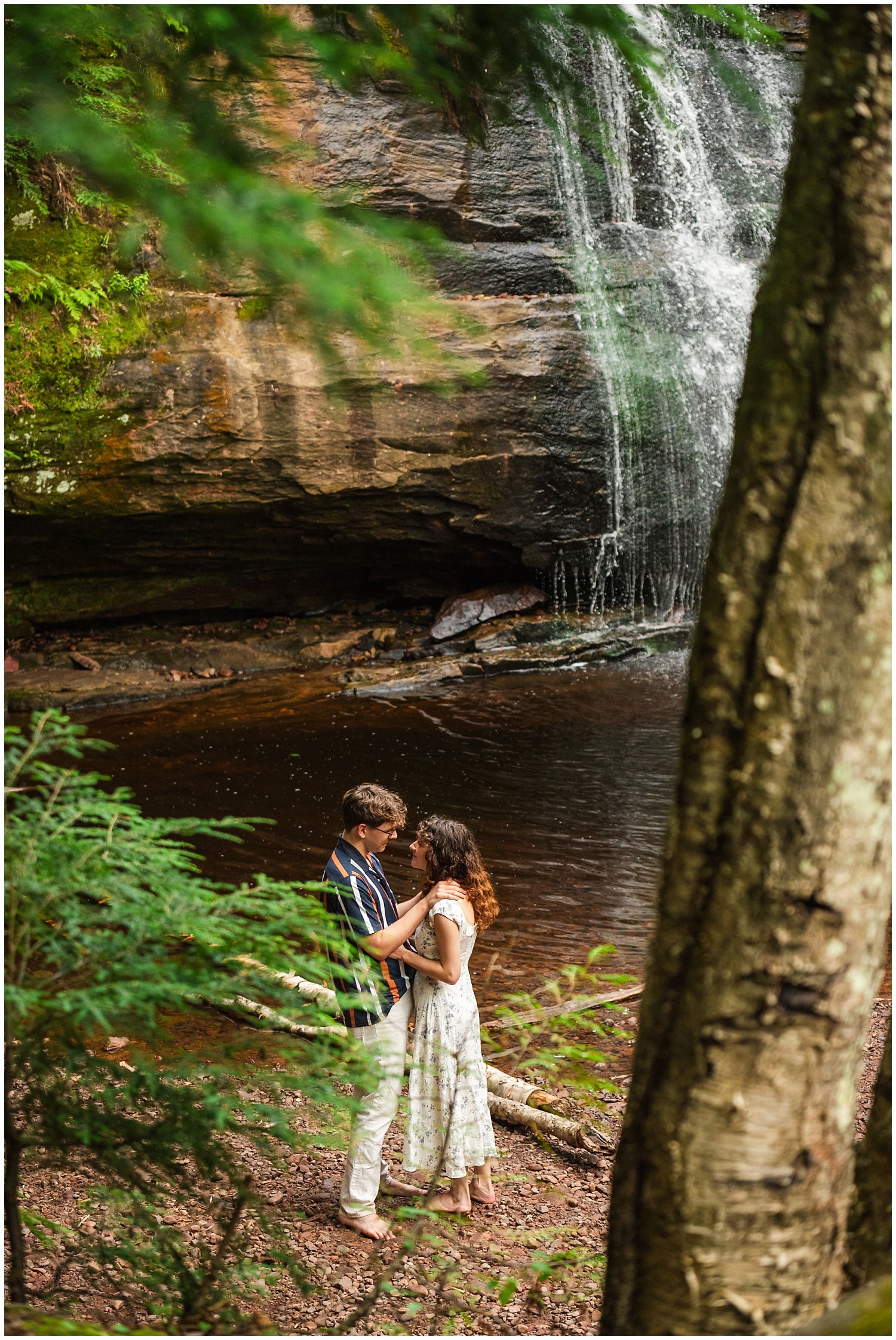 man prepares for surprise waterfall proposal at hungarian falls in keweenaw peninsula