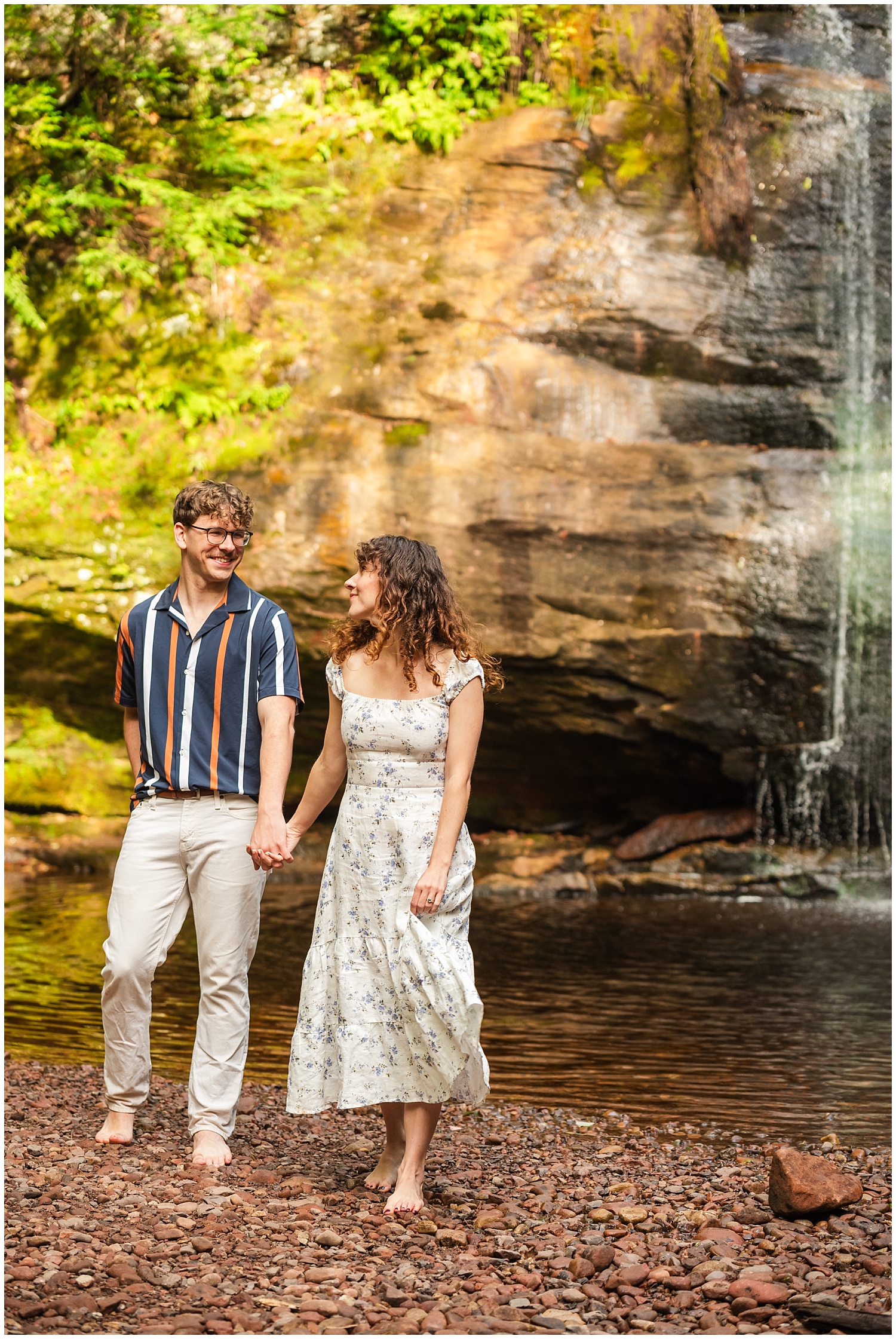girl leads boy during hungarian falls engagement pictures after surprise proposal