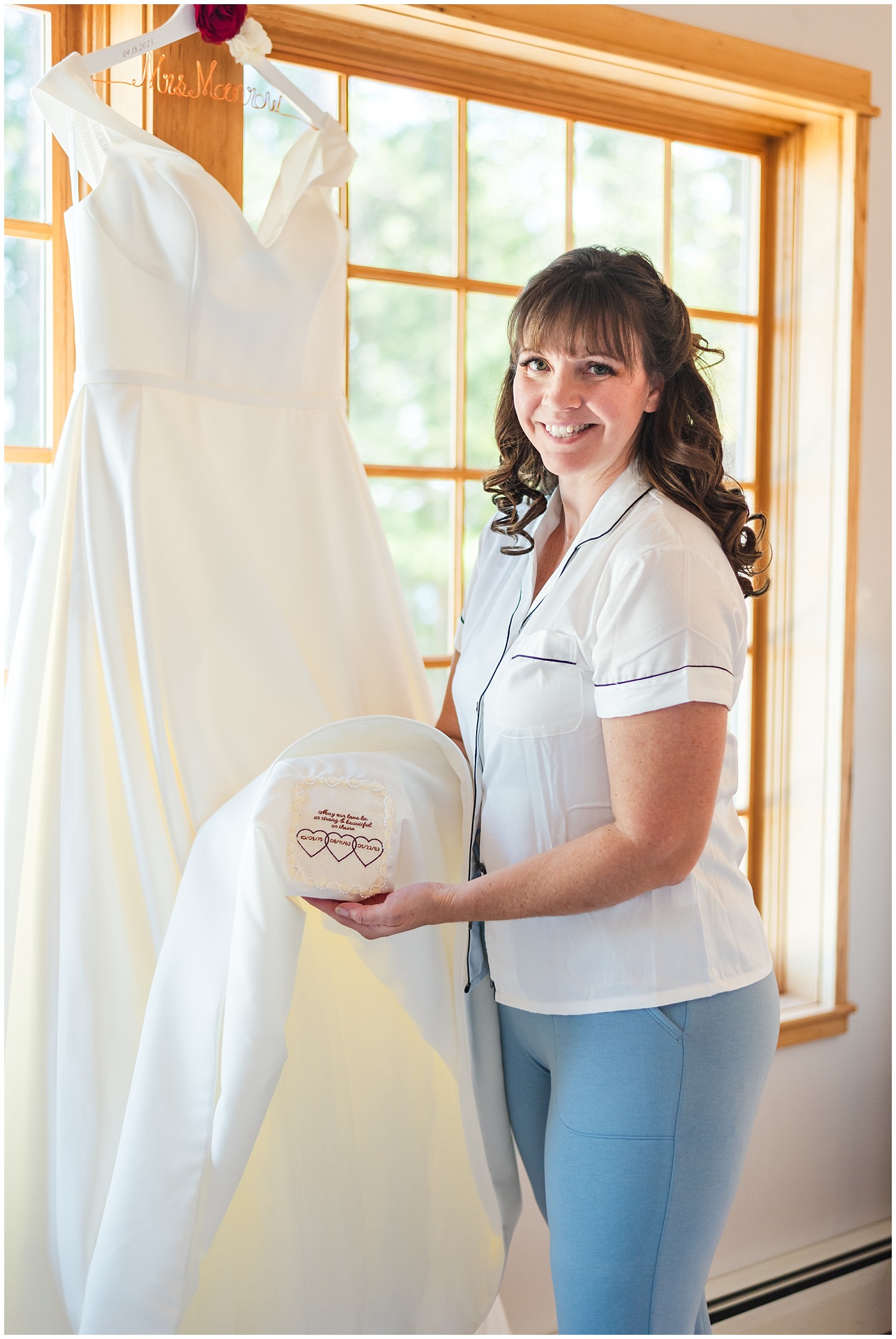 bride shows special patch sewn into wedding gown