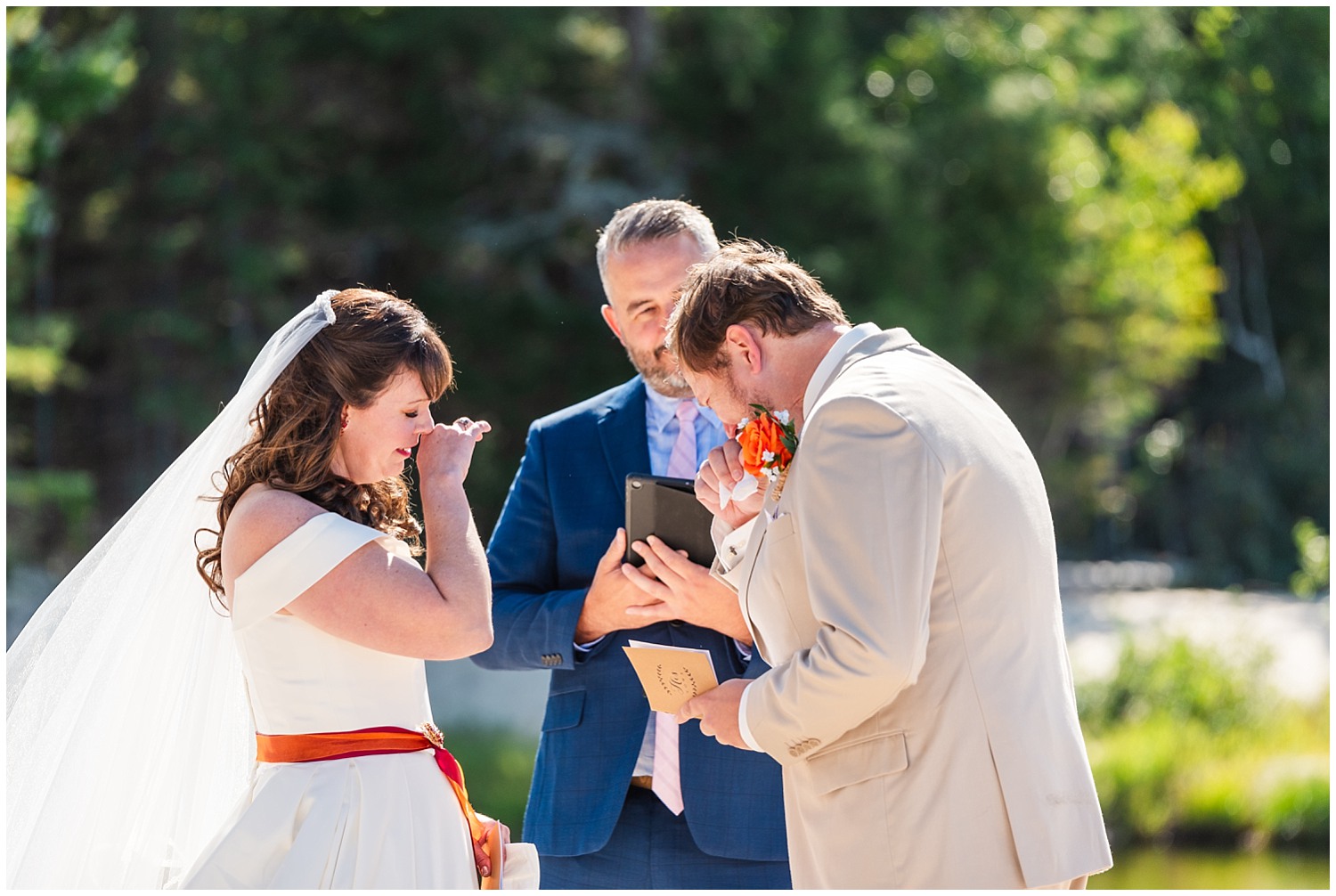 wedding couple both shed tears during upper peninsula wedding ceremony in munising